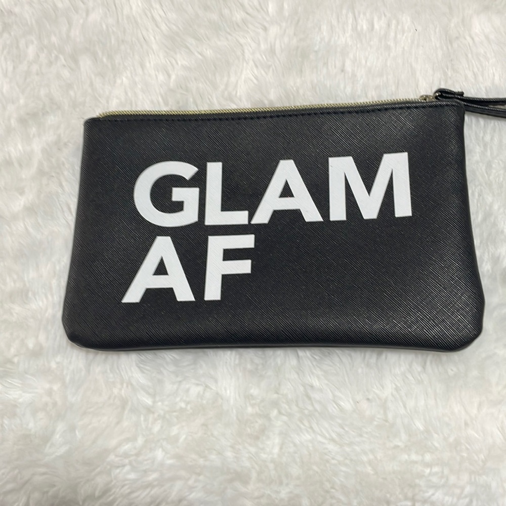 Crimes of Beauty Wrist wallet, black.